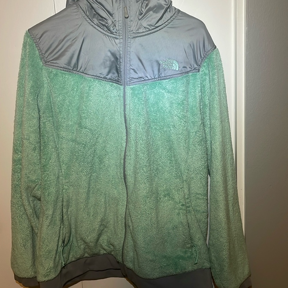 Teal/mint green North Face Fleece jacket.
